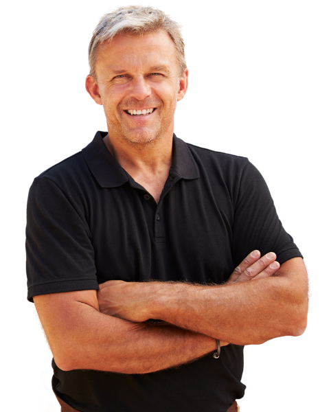 a smilling man in a black shirt posing with crossed arms during a bathroom remodel project in the city.