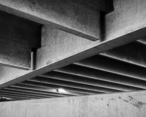 A black and white photo of a concrete structure.