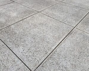 A close up view of a concrete floor in a city