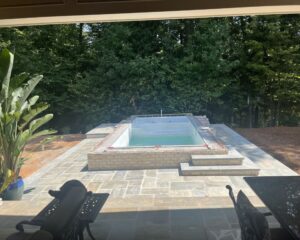 Backyard pool construction in progress