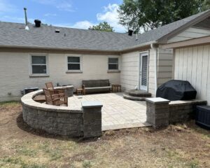 Backyard patio with furniture and barbecue grill