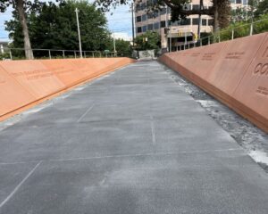 Outdoor monument path with engraved walls