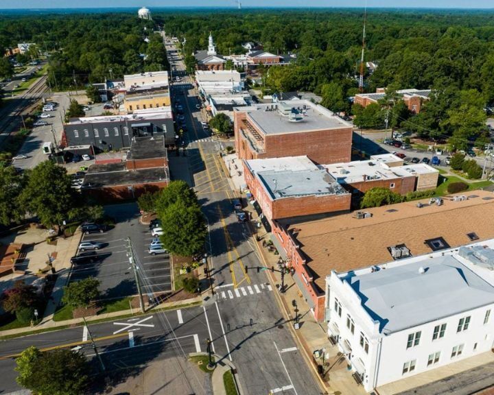 Aerial view of downtown with streets and buildings.