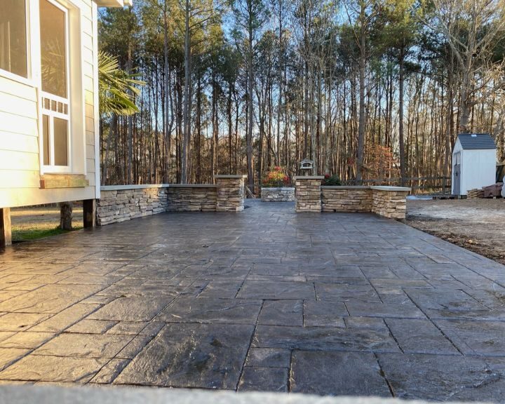 Stone patio with surrounding forest view