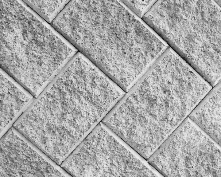a black and white photo of a stone wall.
