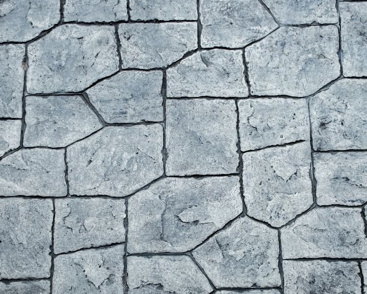 A close up image of a gray stone walkway.